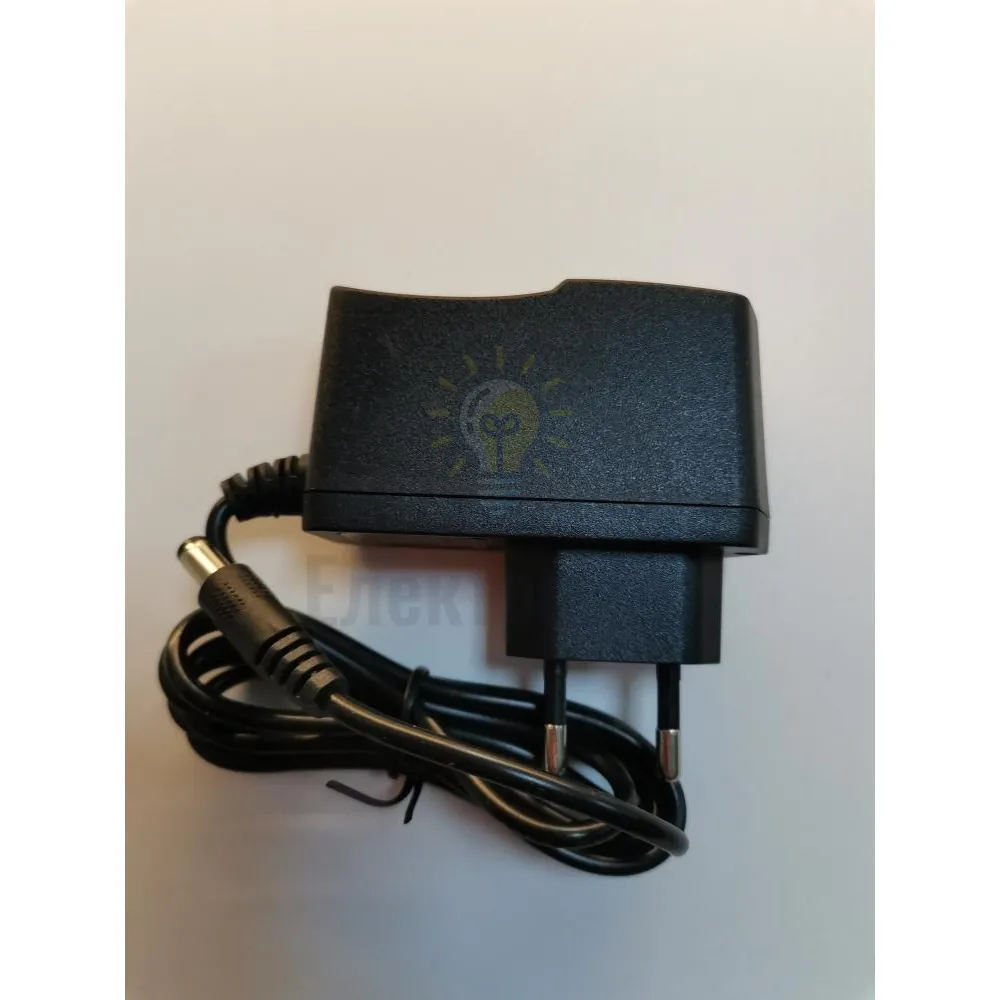 Блок  живлення 12В пластик (з кабелем живлення2А) - 12V 1013305 